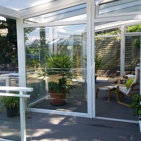 Pultdachwintergarten mit verschiedenen Dacheindeckungen